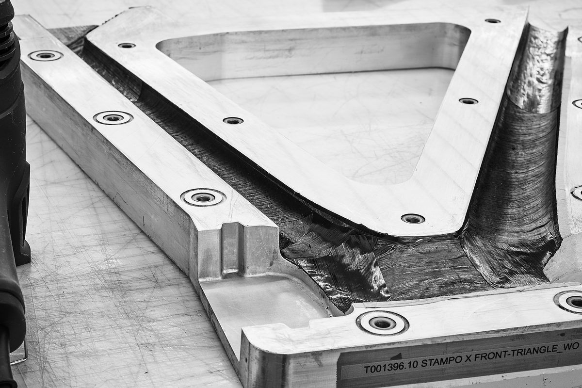 Aluminium mould for a carbon front triangle with carbon plies in place